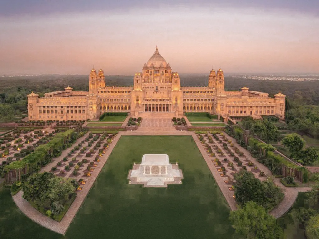 Palace Hotel And Formal Gardens At Dusk